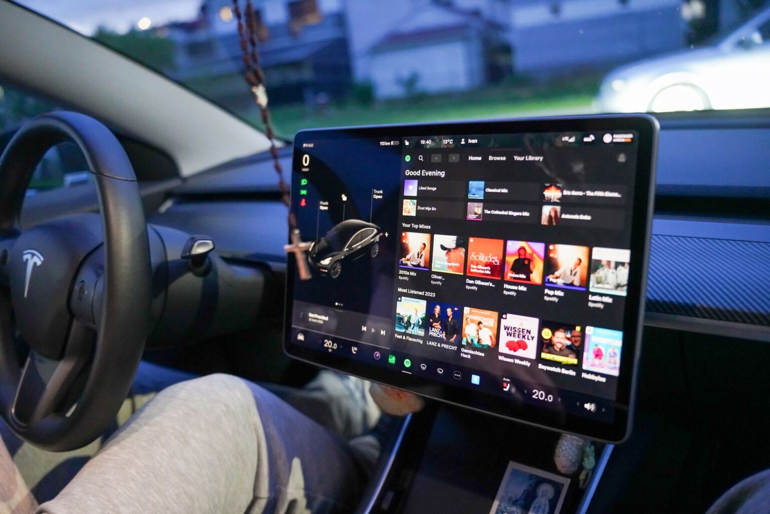 Close-up of a Tesla's digital dashboard showcasing entertainment options.