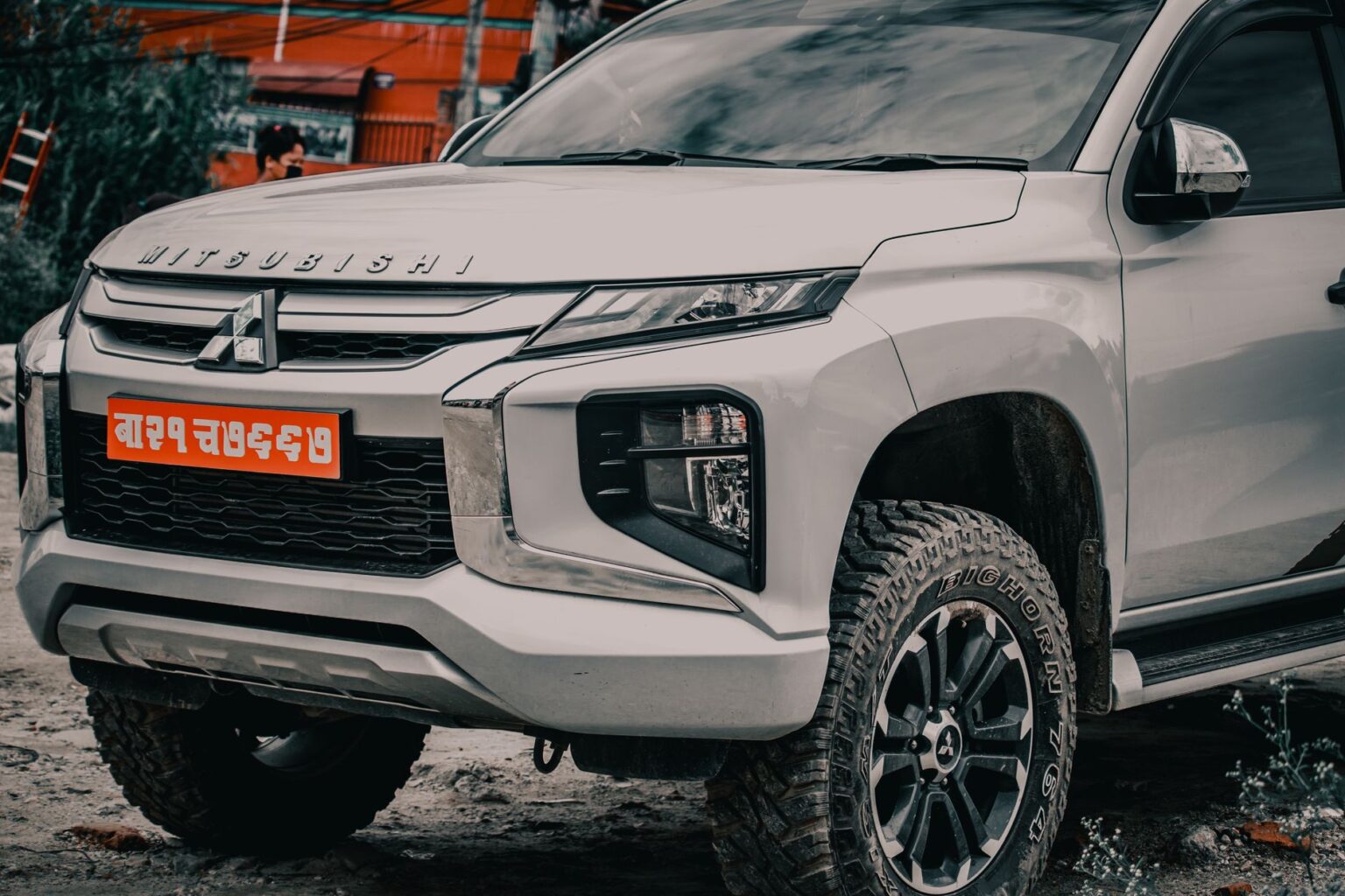 Close-up of an SUV's side step and rugged lower body design