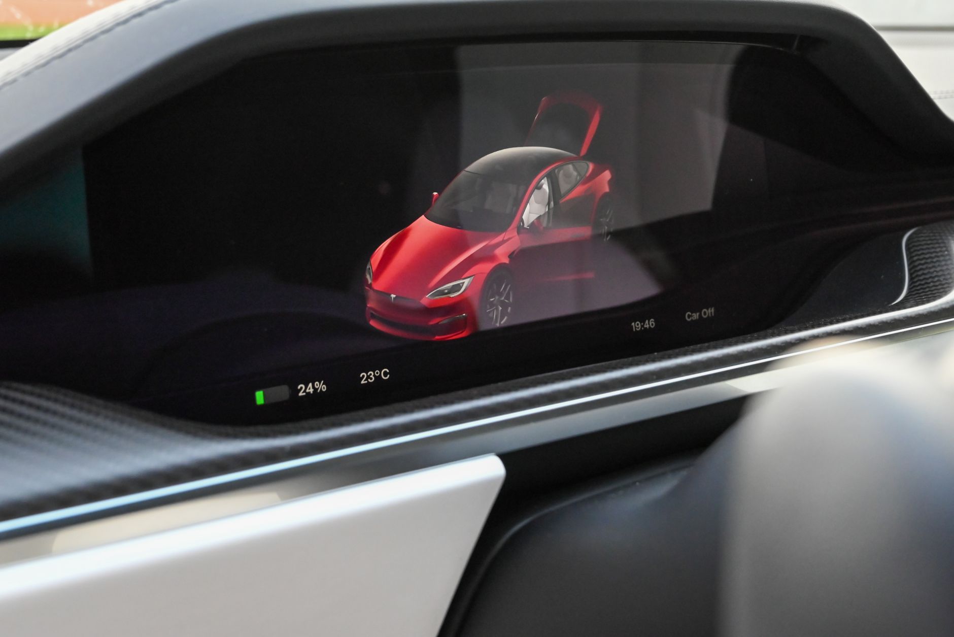 Close-up of a Tesla dashboard and console