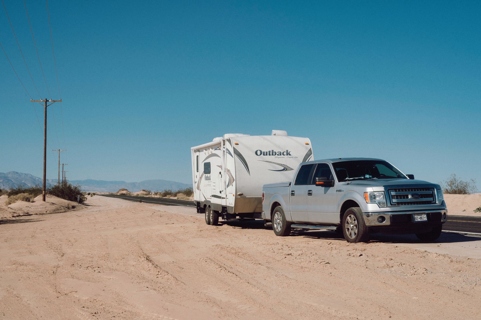 Towing cuts your Tesla’s range hard. Plan charging stops around it, not your dashboard estimate.